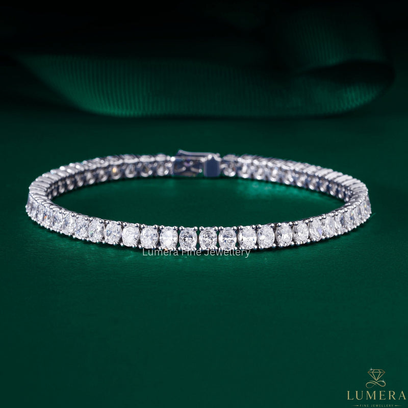 Oval Cut Diamond with oval diamond tennis bracelet.
