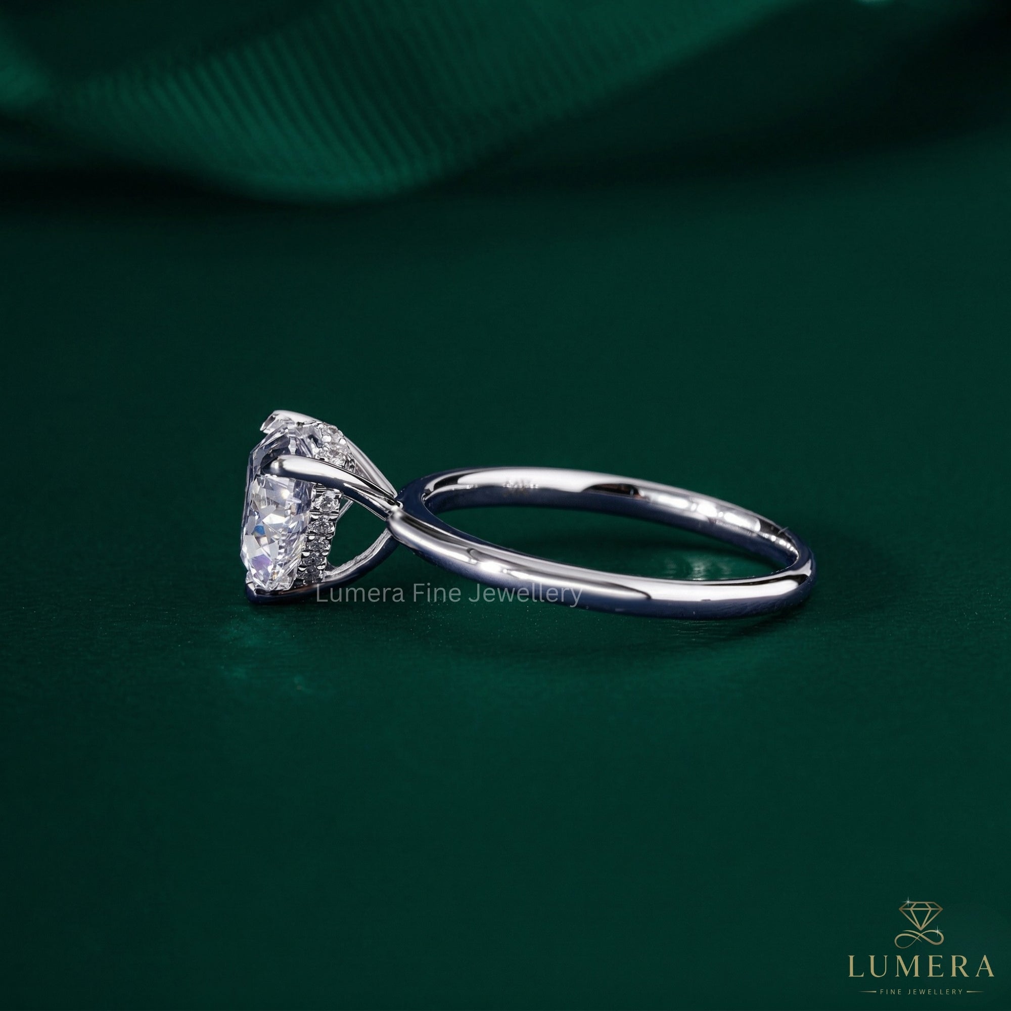 hidden halo setting ring in 3 prong setting.
