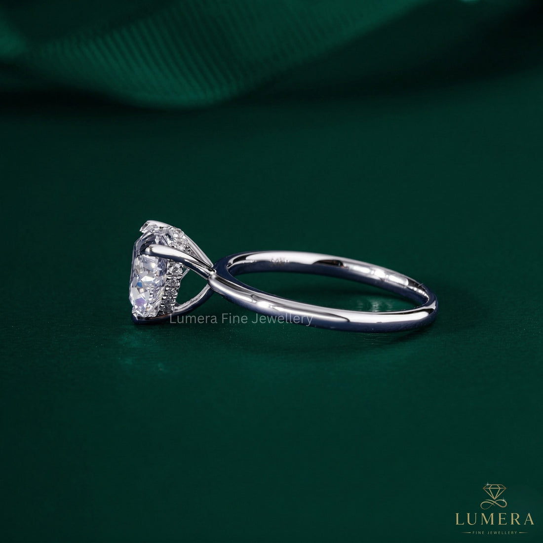 hidden halo setting ring in 3 prong setting.
