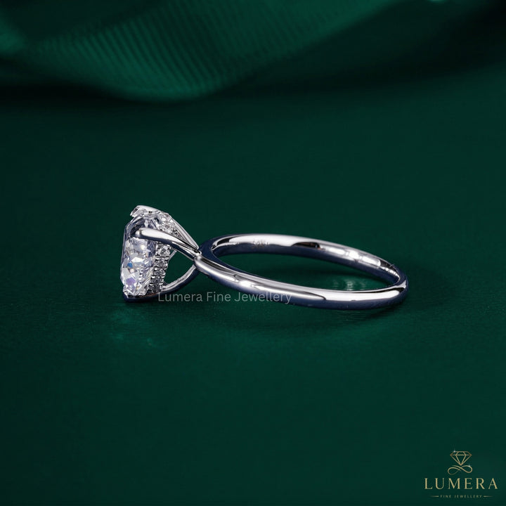 hidden halo setting ring in 3 prong setting.
