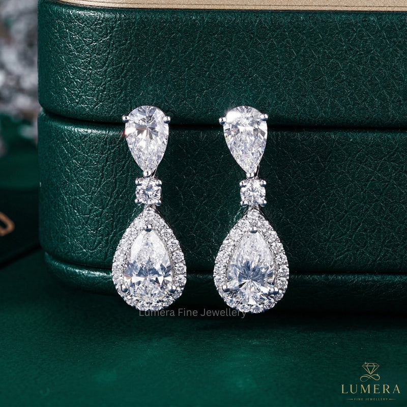 pear earrings with pear shaped earrings.
