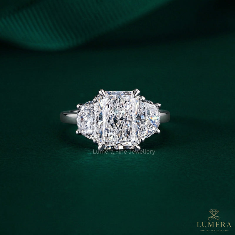 three stone diamond engagement ring with radiant cut ring.
