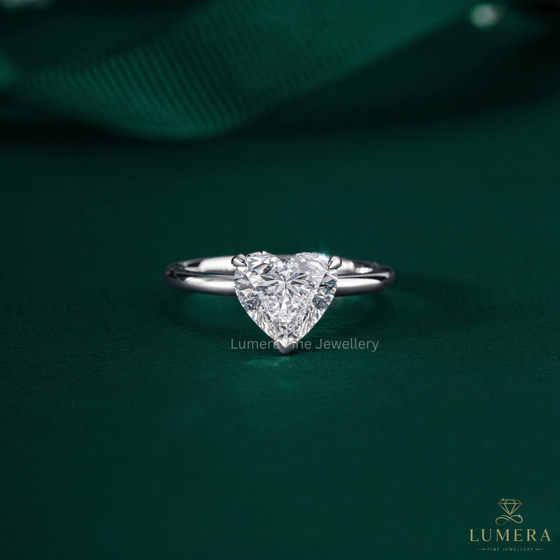 heart shaped engagement ring with heart cut ring.
