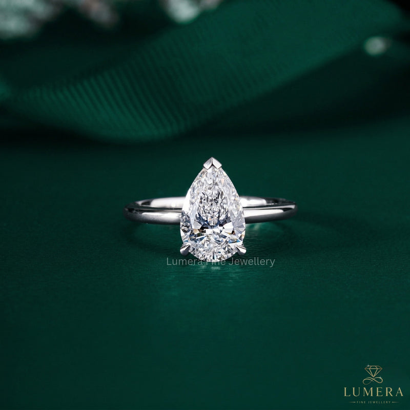 Pear Cut Engagement Ring with hidden halo ring.