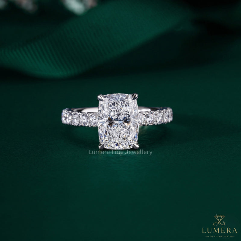 elongated cushion cut engagement ring with hidden halo engagement ring.
