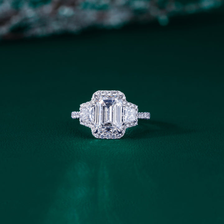 three stone emerald cut engagement ring.