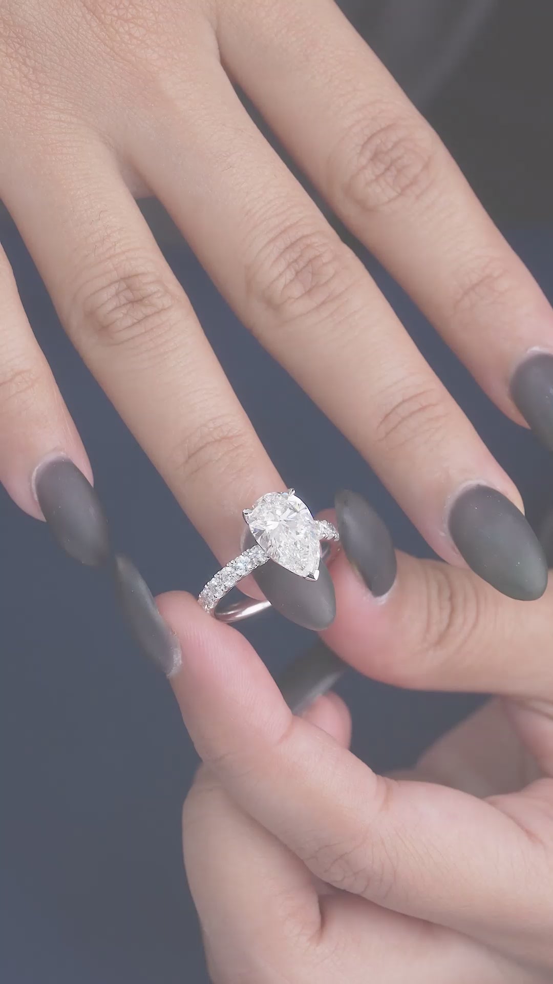 lumera diamond ring in pear engagement ring style.
