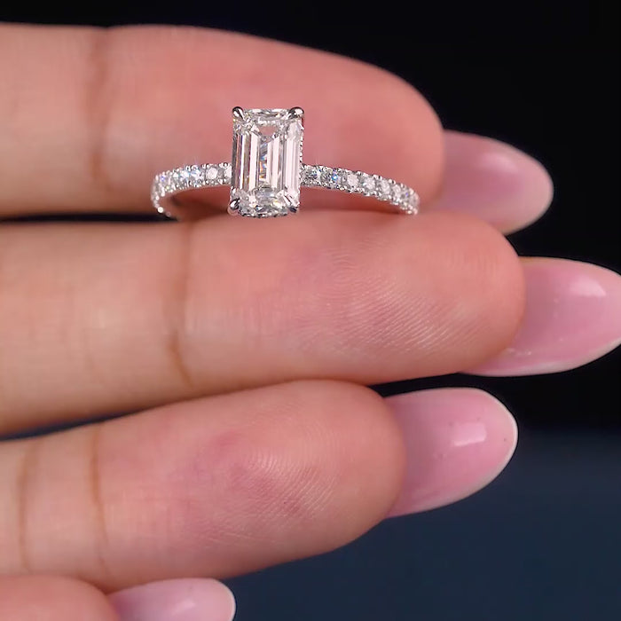 pave set ring with emerald hidden halo ring.
