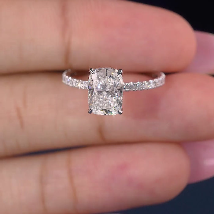 Elongated Cushion Cut Ring on pave set engagement ring.
