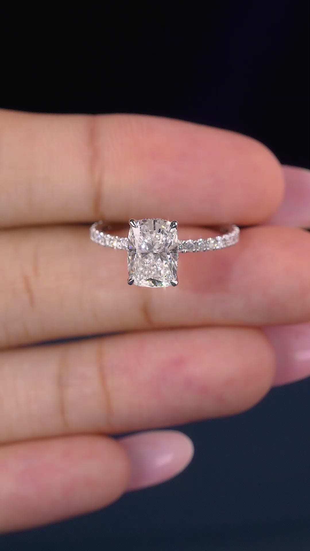 Elongated Cushion Cut Ring on pave set engagement ring.
