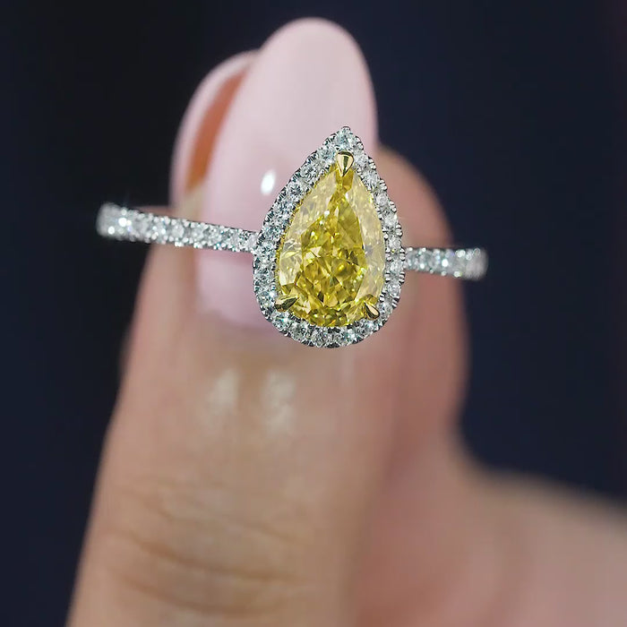 pave ring with pear diamond engagement ring pave band.
