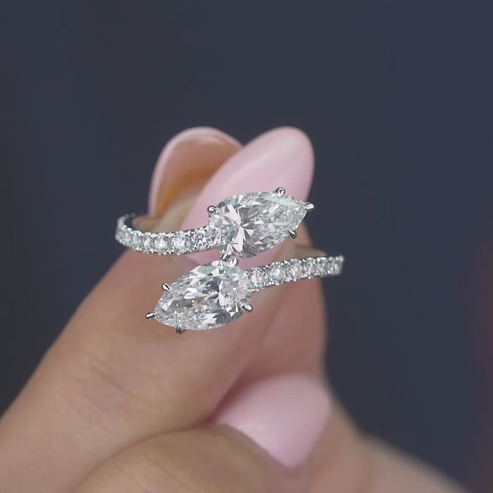 pear engagement ring with solid gold ring.
