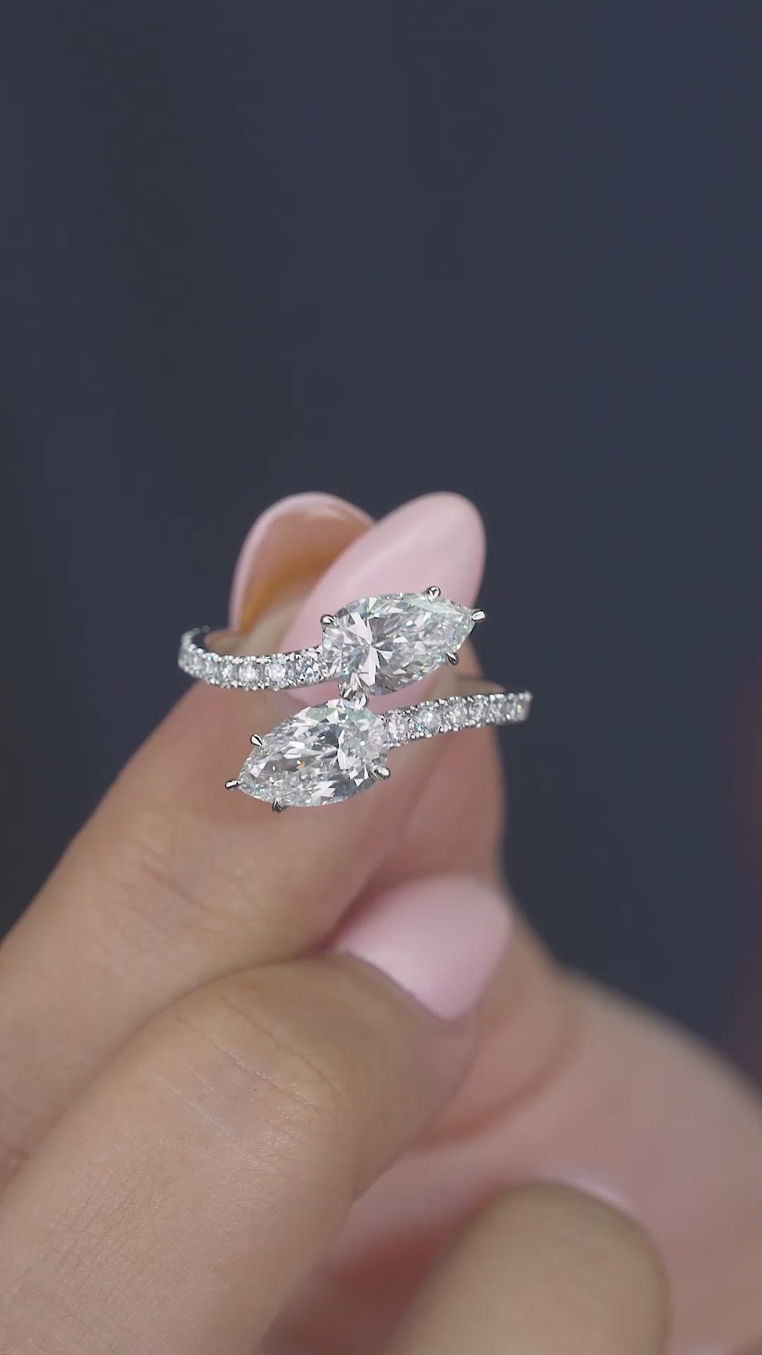 pear engagement ring with solid gold ring.
