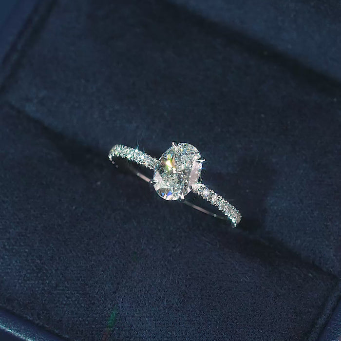 oval cut ring with double hidden halo ring.
