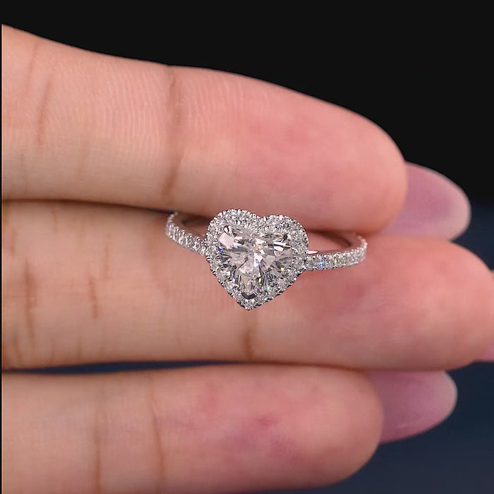 halo setting engagement ring with cathedral setting ring.
