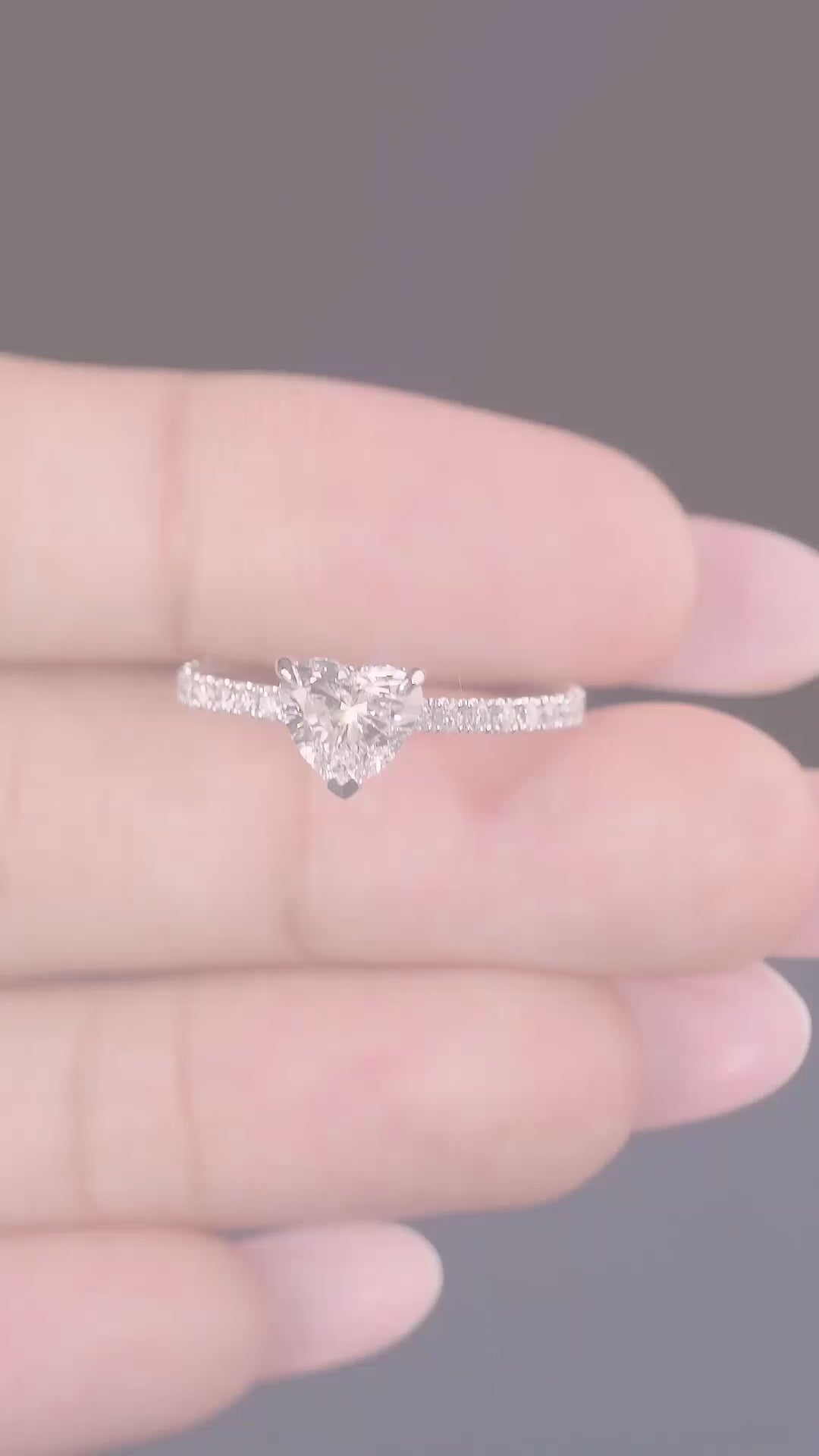 Heart Shaped Engagement Ring with pave setting band.
