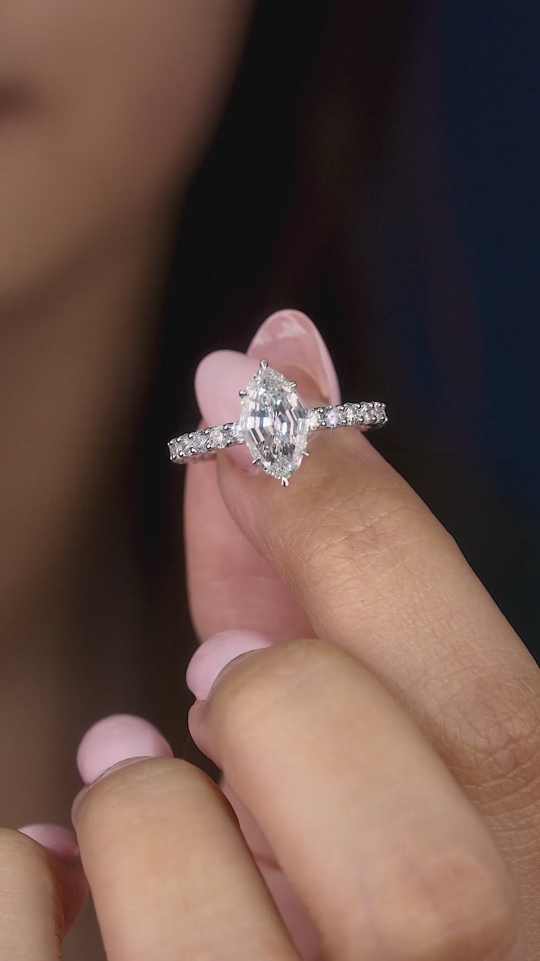 marquise cut engagement ring on aesthetic ring.
