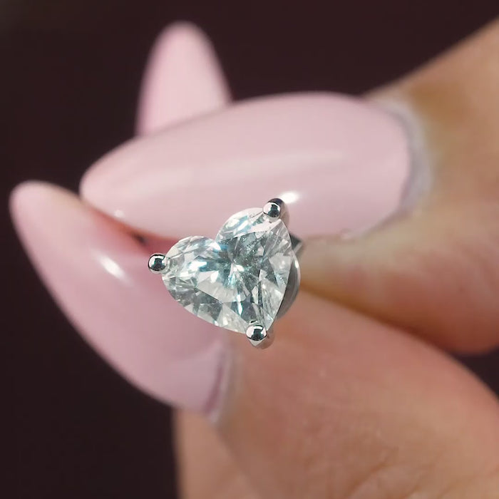 lab grown diamond with solid gold earrings.

