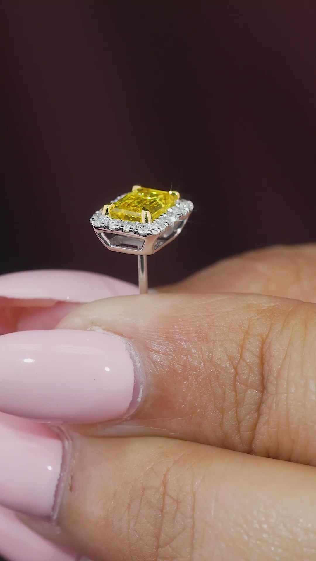 emerald cut diamond earrings with halo setting.
