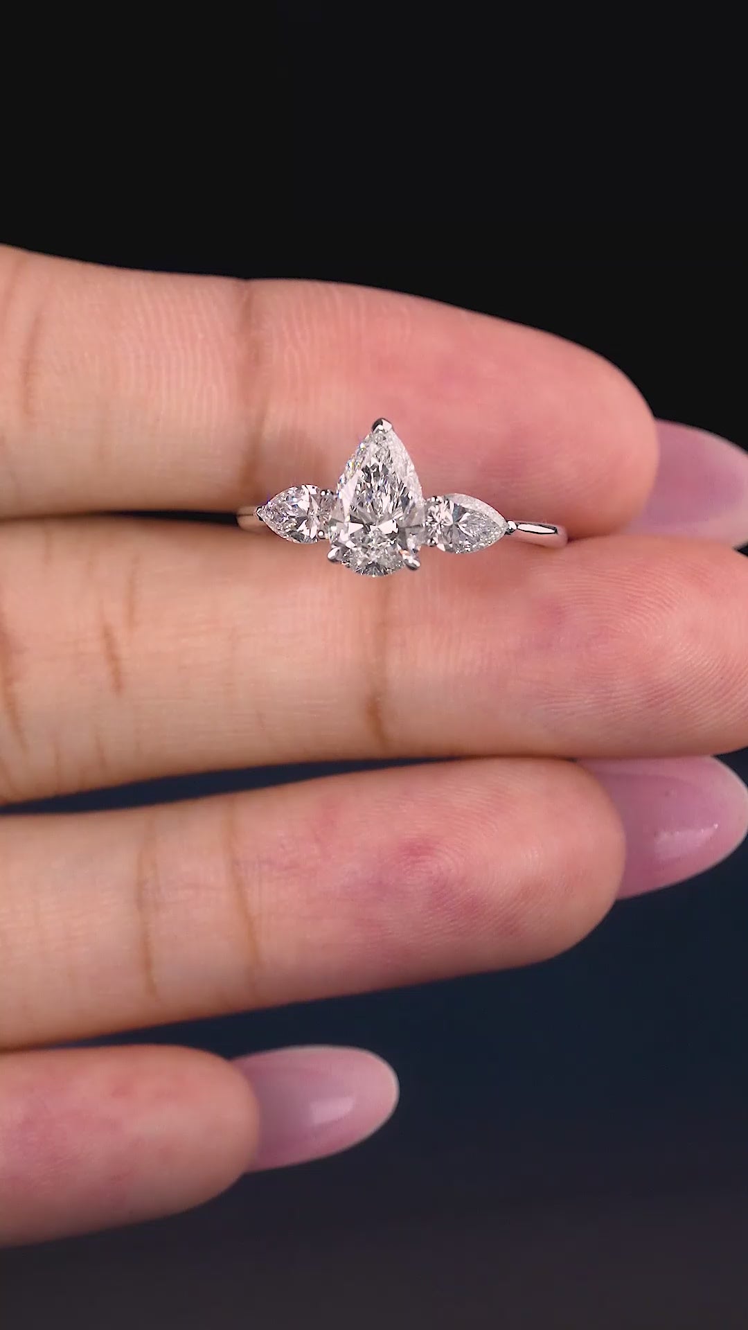 three stone diamond ring on trilogy ring.
