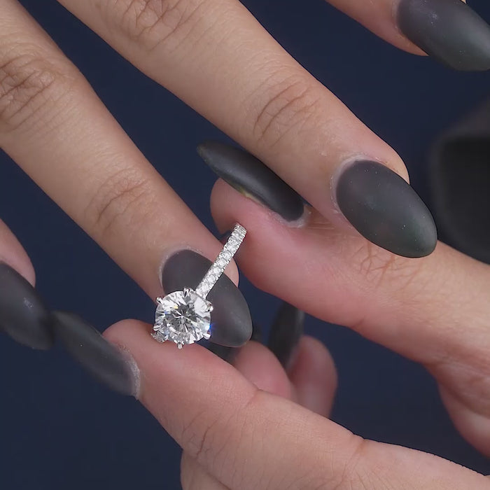 round cut diamond ring with cathdral setting ring.
