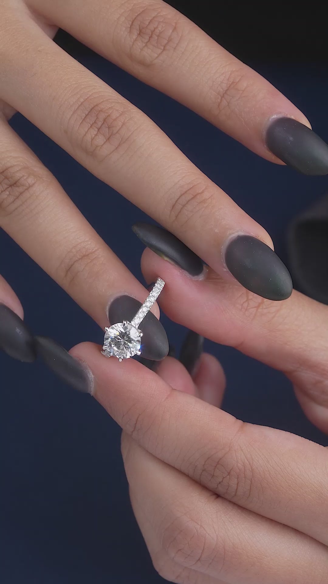 round cut diamond ring with cathdral setting ring.
