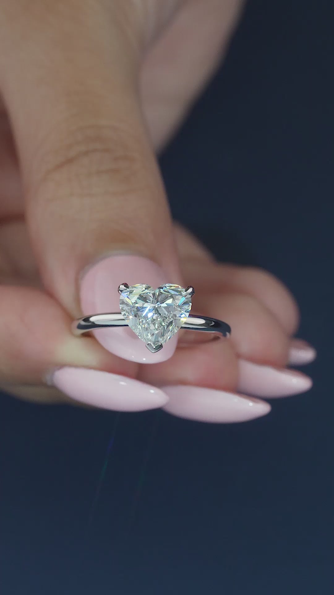 3 prong setting on solid gold engagement ring.
