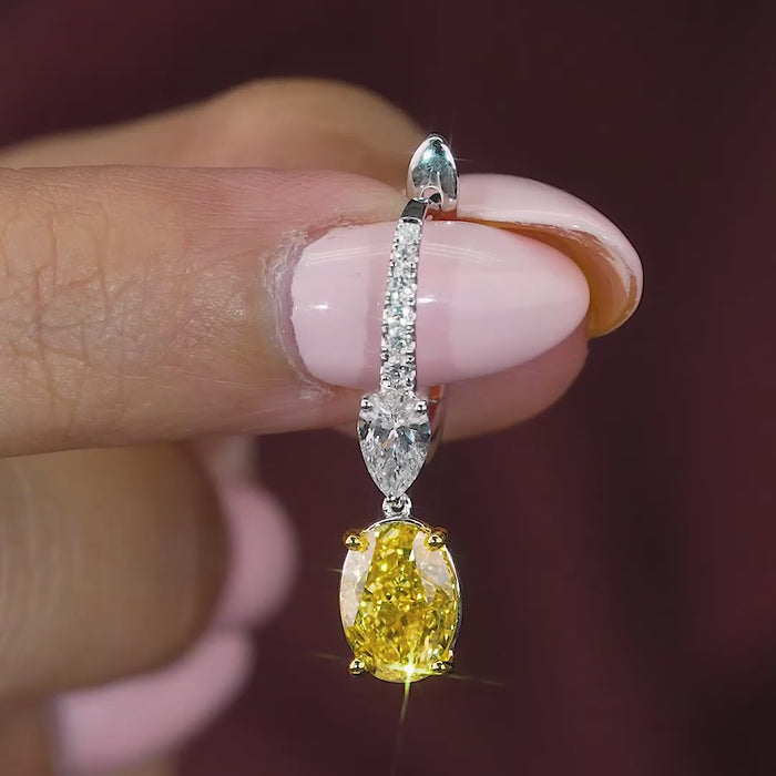oval cut hoop earrings with pear cut earrings.
