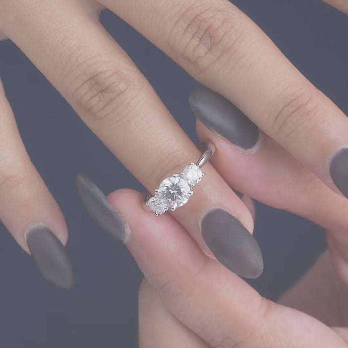 round cut ring in Sweeping prong ring style.
