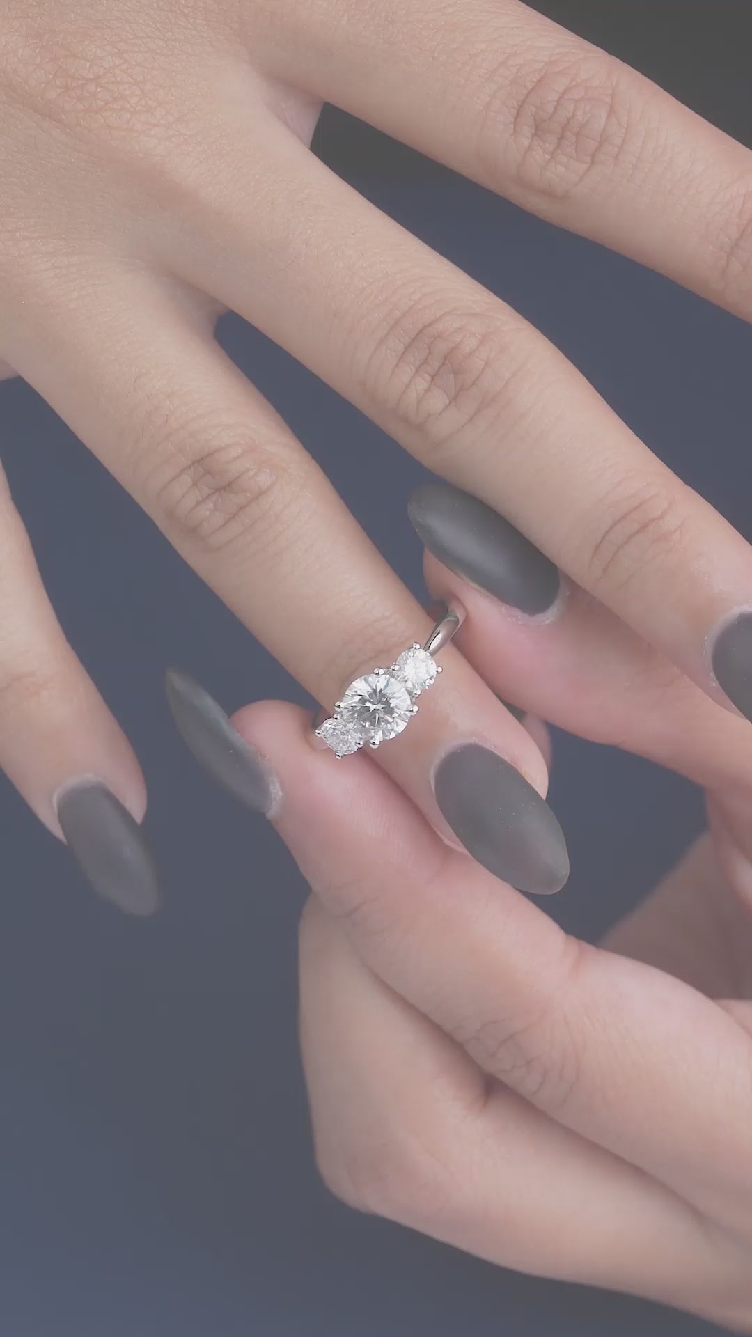 round cut ring in Sweeping prong ring style.
