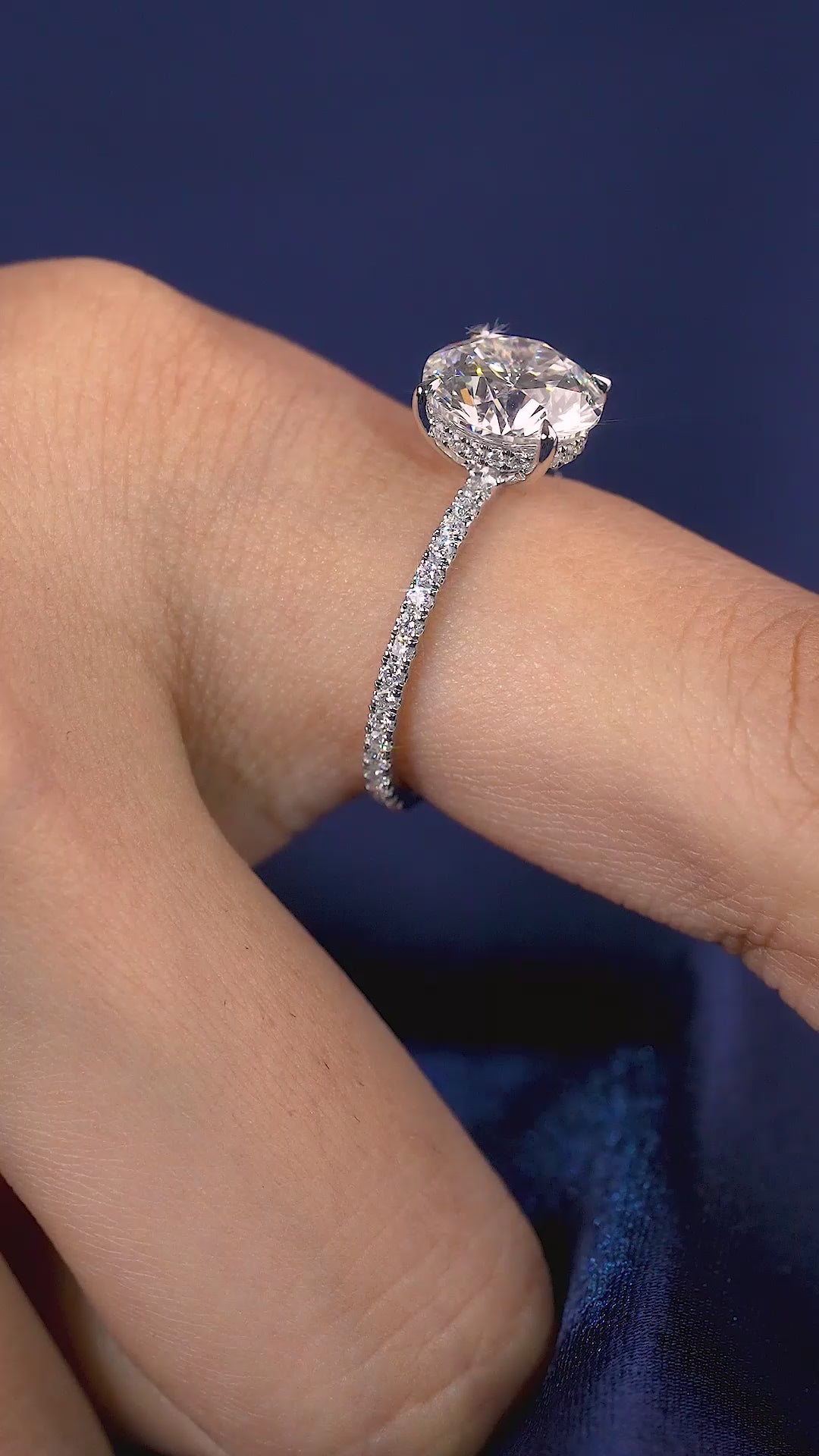 hidden halo ring with elongated cushion engagement ring.