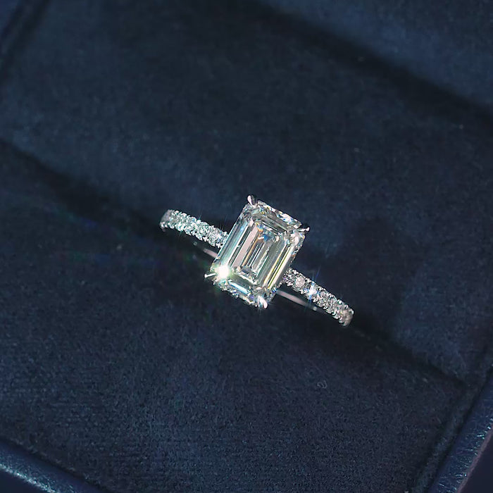 Emerald diamond engagement ring with Hidden halo engagement ring.